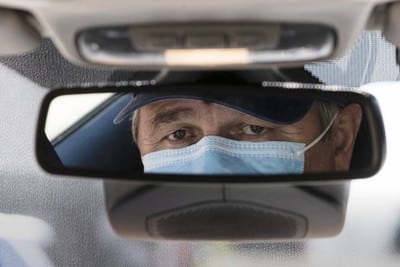 uber taxi lyft driver mask rearview covid coronavirus rideshare safety - Radio Samoa
