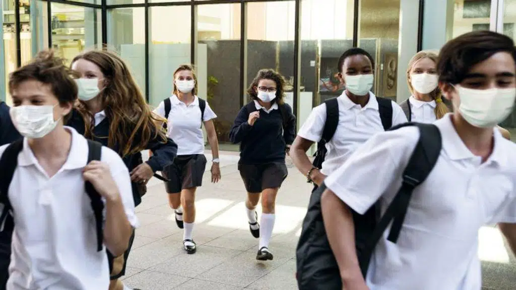 student with mask