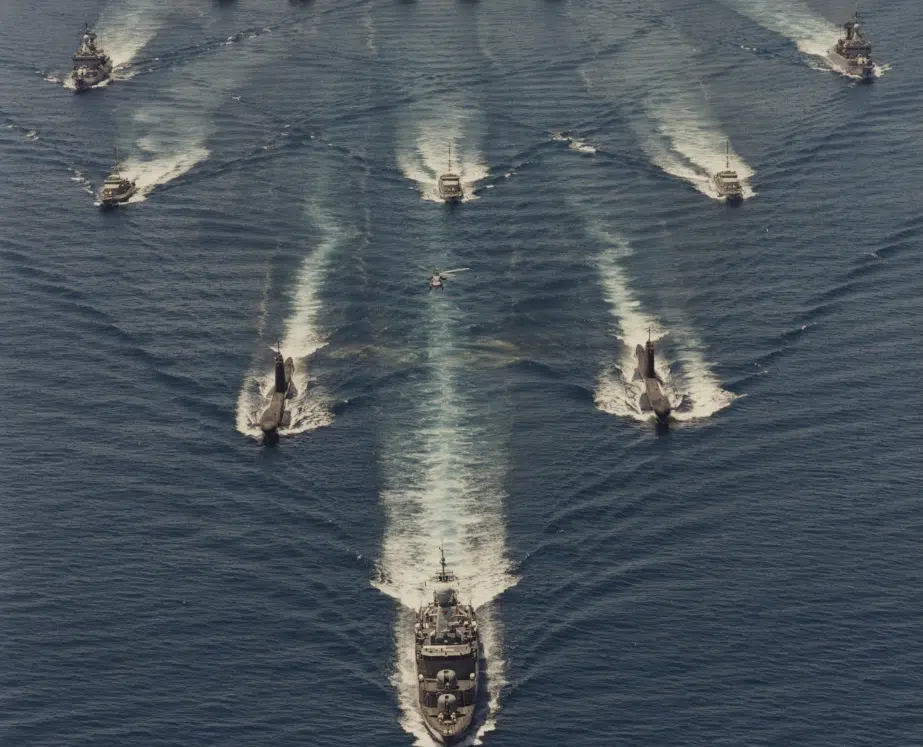 The international fleet, made up of vessels from five nations, conduct a formation entry into Darwin Harbour led by HMTS Sukhothai upon the conclusion of Exercise KAKADU TWO