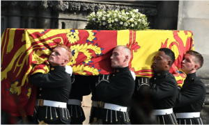 The coffin of Queen Elizabeth II is carried into St Giles Cathedral