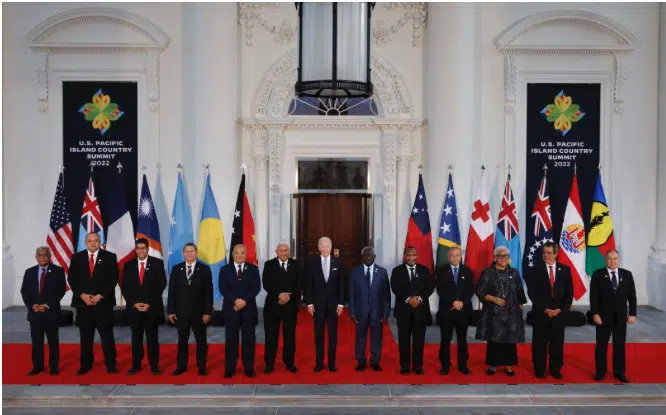 President Joe Biden and leaders from the Pacific Islands region pose for a photograph on the North Portico of the White House 29 September in Washington, DC