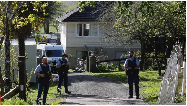 Police staff posted at the entrace of the Nga Kete bail facility in Dairy Flat, north of Auckland