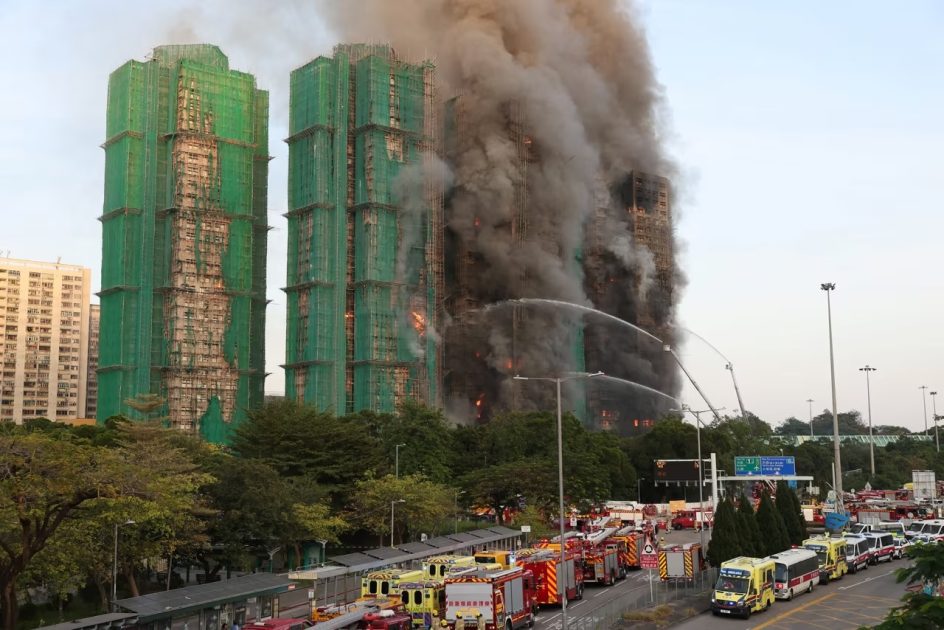 Efforts are underway to extinguish flames engulfing bamboo scaffolding across multiple buildings at the Wang Fuk Court housing estate in Hong Kong on November 26