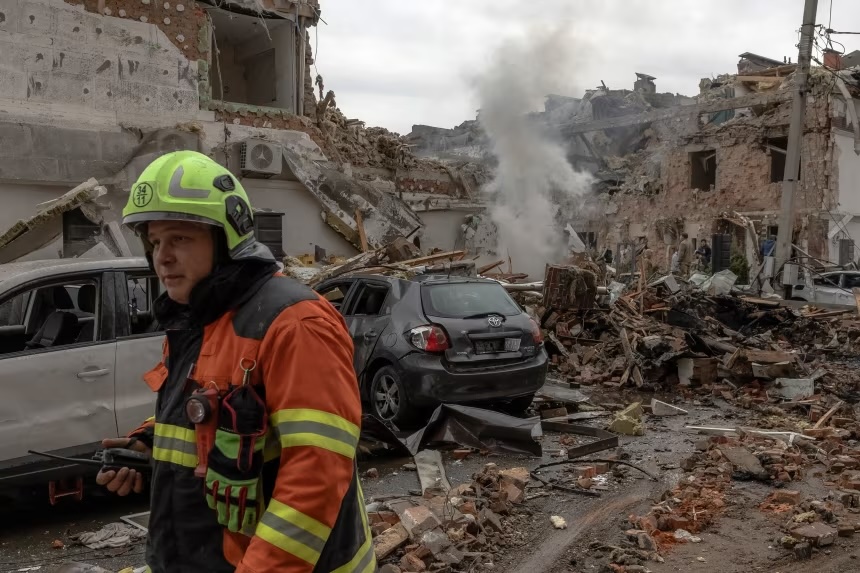 The aftermath of a Russian aerial attack on the outskirts of Kyiv, on September 28