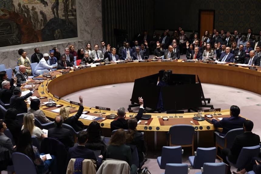 UN ambassadors and representatives vote during a United Nations Security Council meeting on a US-drafted resolution on the Gaza plan in New York on Monday.