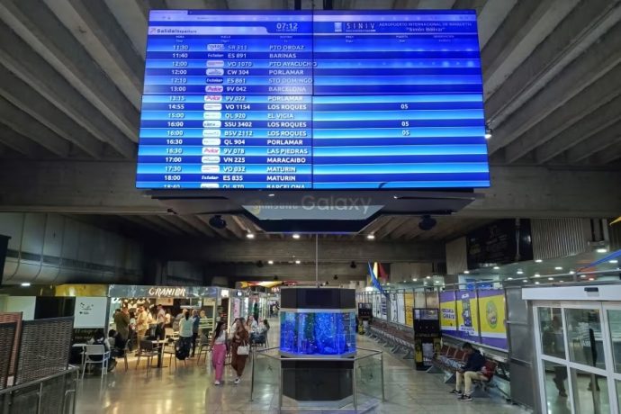 A view of a departures and arrivals screen at the Simon Bolivar International airport in Maiquetia, La Guaira State, Venezuela, in June 2024