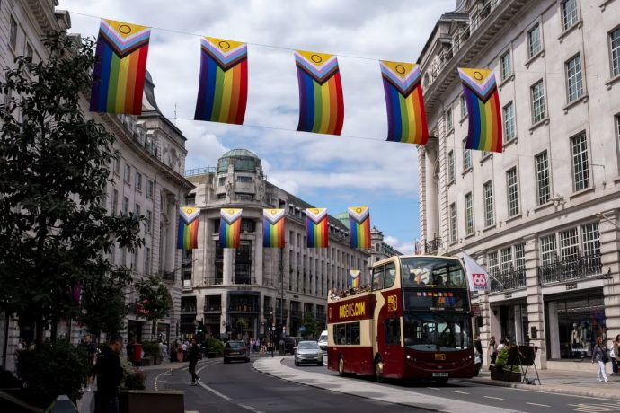 Pride flags hang above Regent Street in advance of the Pride in London, on July 7