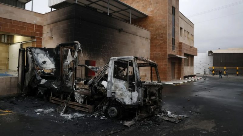 The warehouse in Beit Lid was attacked, with lorries set on fire