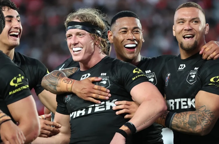 The Kiwis celebrate Phoenix Crossland of the Kiwis try C during New Zealand Kiwis v Tonga XIII round 3 of the Pacific Championships at Eden Park