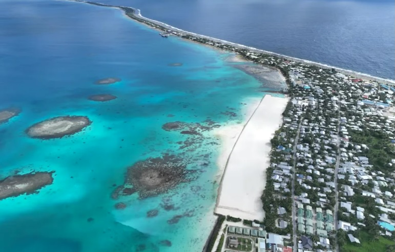 Tuvalus first climate migrants arrive in Australia carrying skills hope and a mission to preserve their sinking homeland.