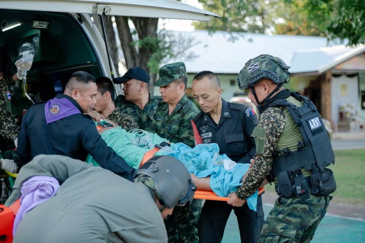 The Thai army is seen tending to an injured person following a skirmish along the disputed Thai-Cambodia border on Sunday.