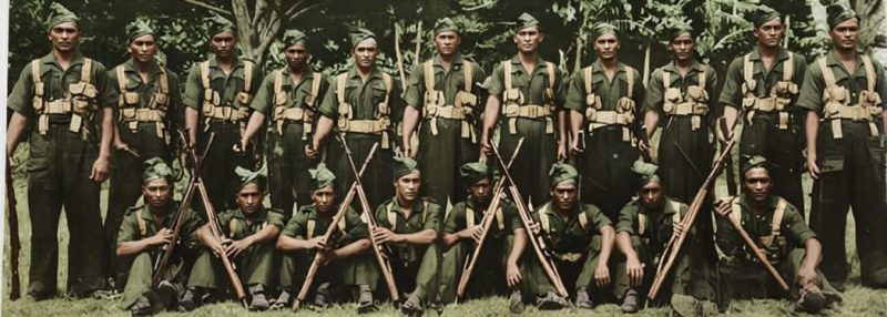 Members of the World War Two Cook Islands Local Defence Force (Home Guard) between 1939 and 1945. Original image owned by Tere Mataroa, Colourised by Tepaeru Utia.