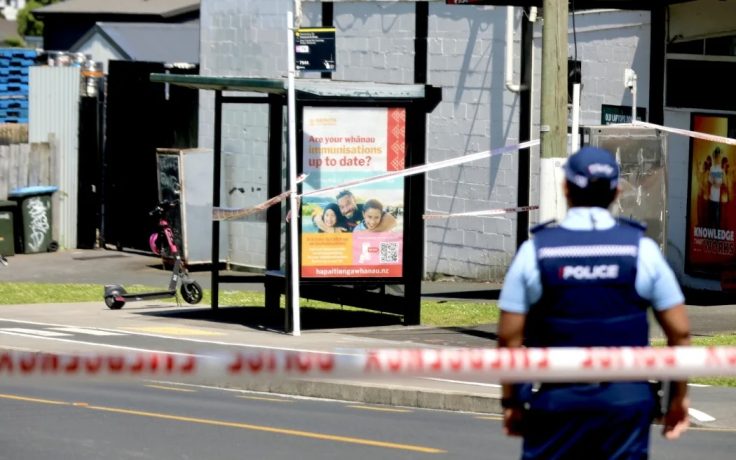Police at the scene of a homicide investigation after attacks on an East Auckland bus.