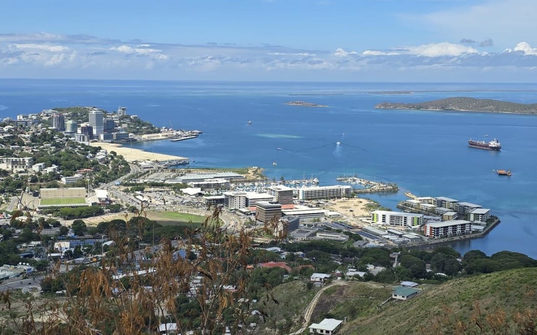 Papua New Guinea's capital, Port Moresby below.