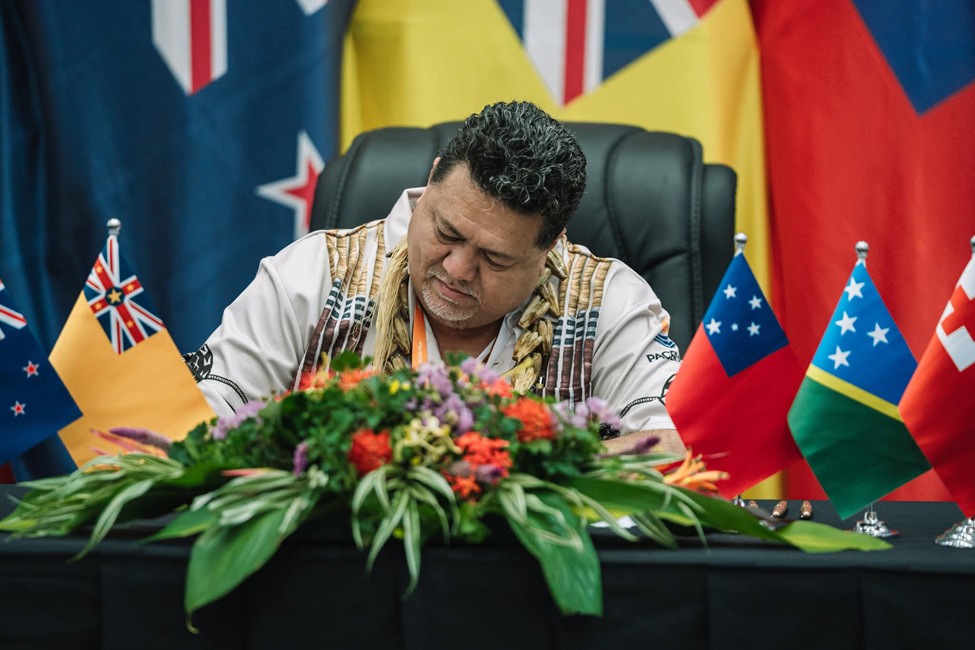 Hon Fata Ryan Shuster represents Samoa in signing Phase II of the Pacer Plus Implementation Arrangement.
