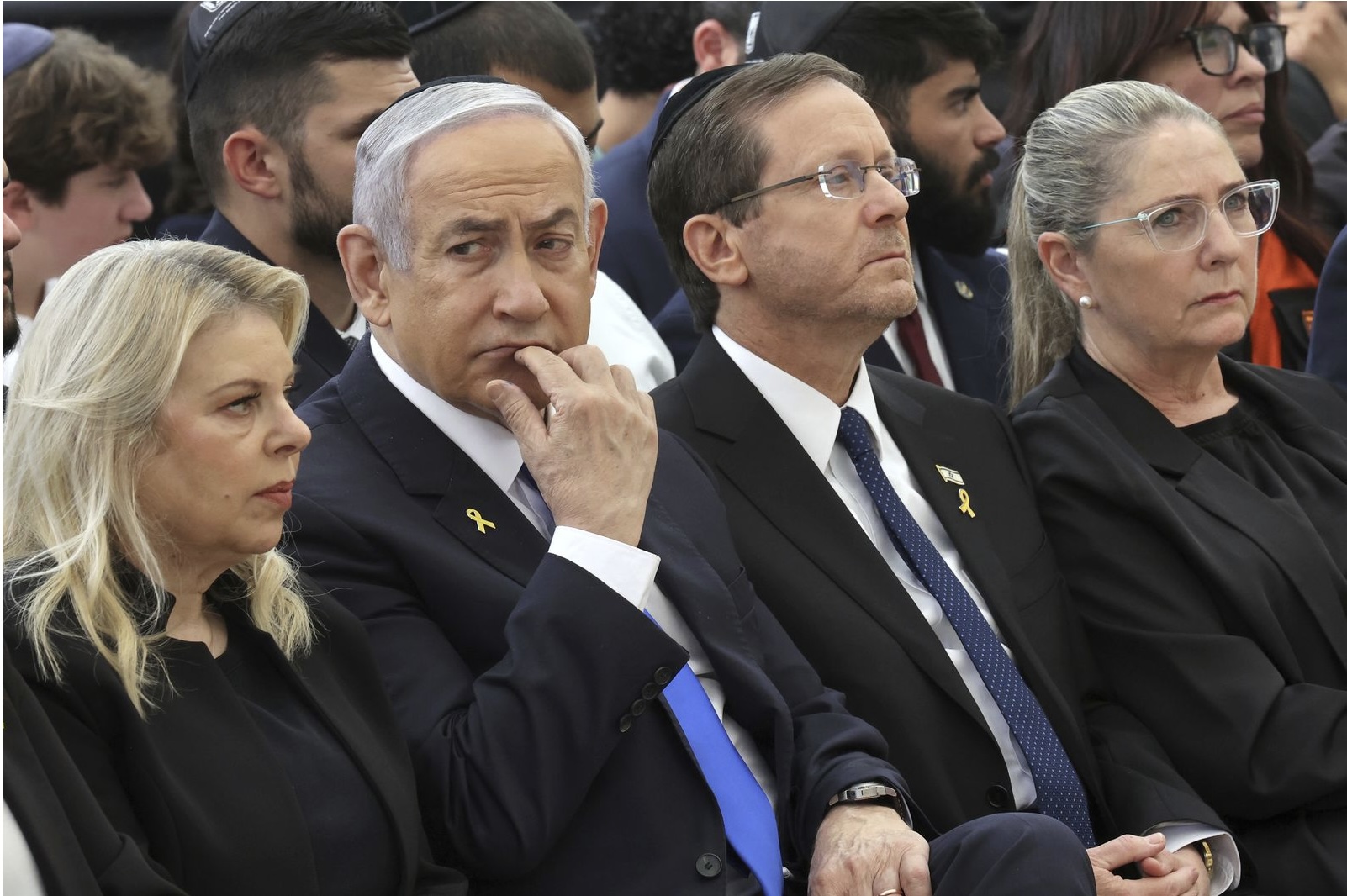 Israeli Prime Minister Benjamin Netanyahu (left) sits with President Isaac Herzog, who will visit Australia next month.
