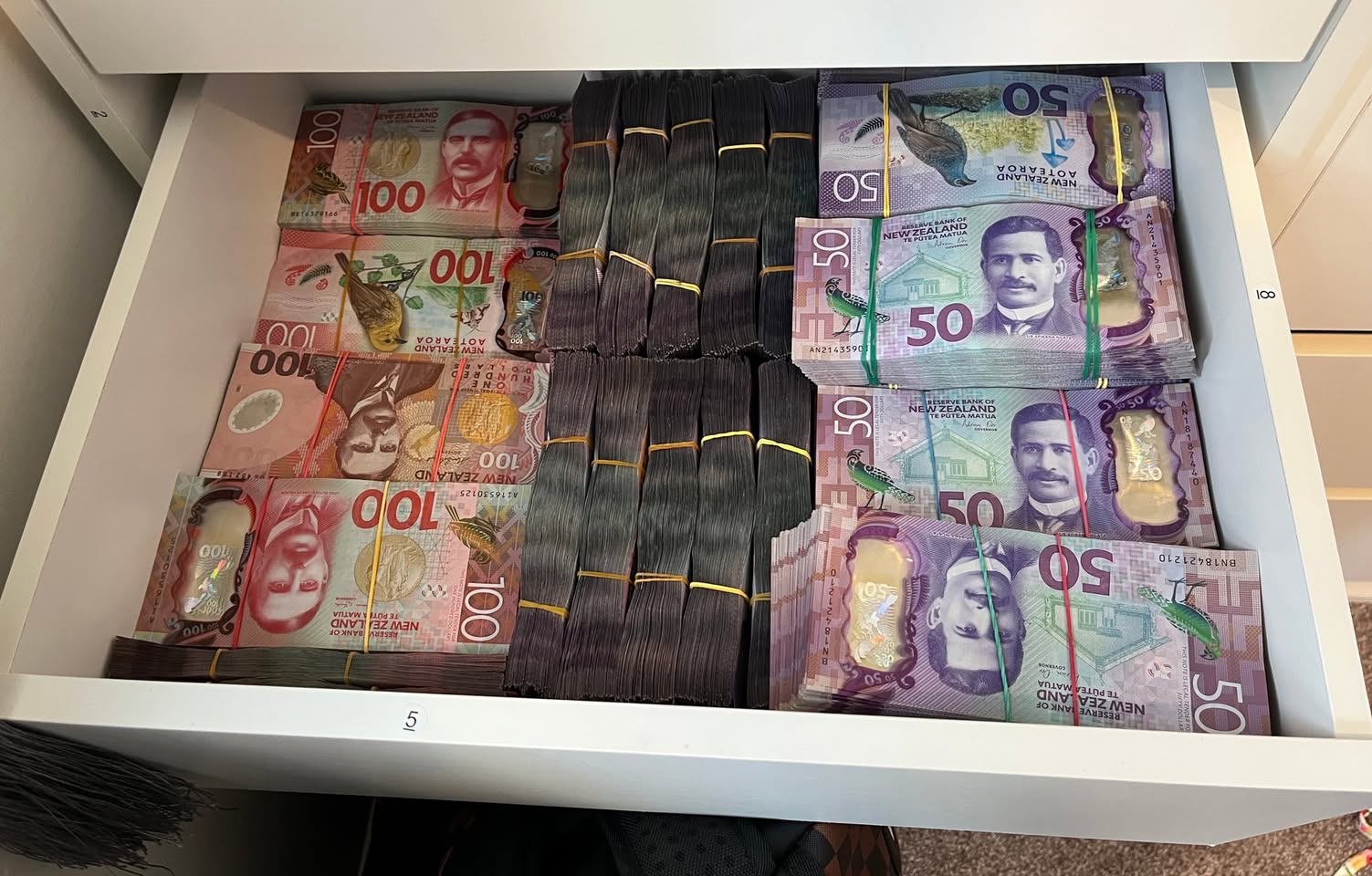 Approximately $500,000 in cash was seized during the search warrants.