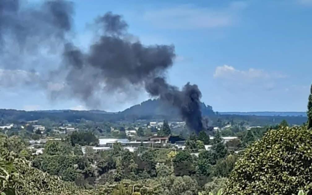 Billows of black smoke rose over Taupō during the fire.