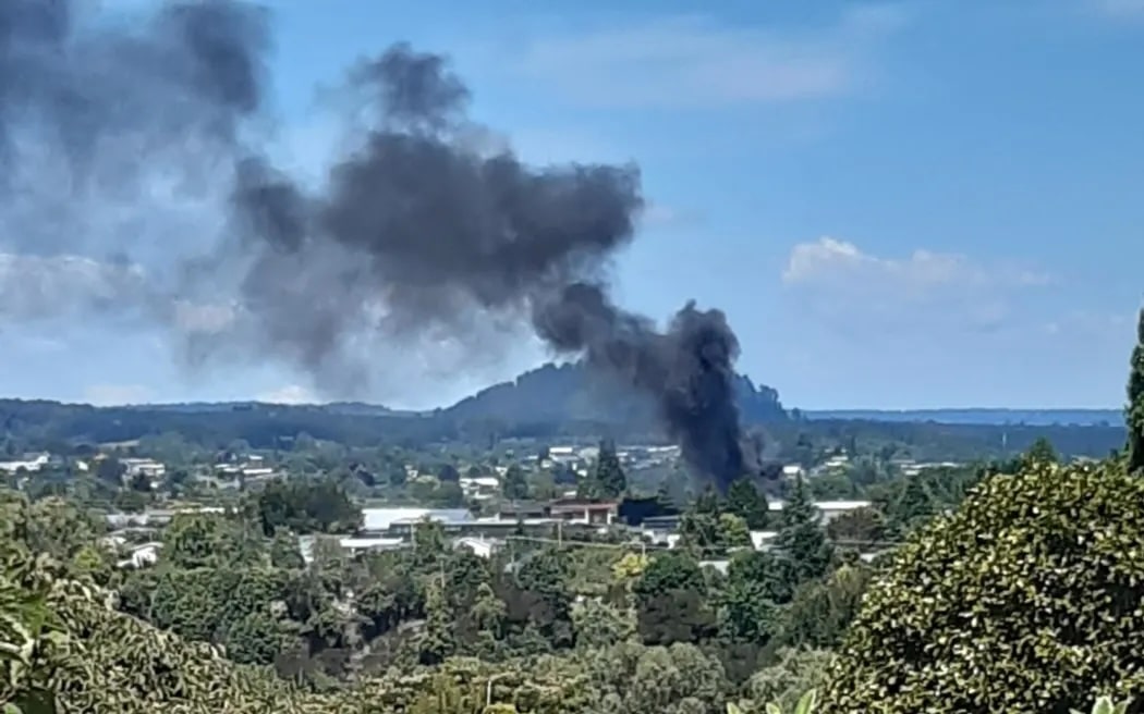 Billows of black smoke rose over Taupō during the fire.