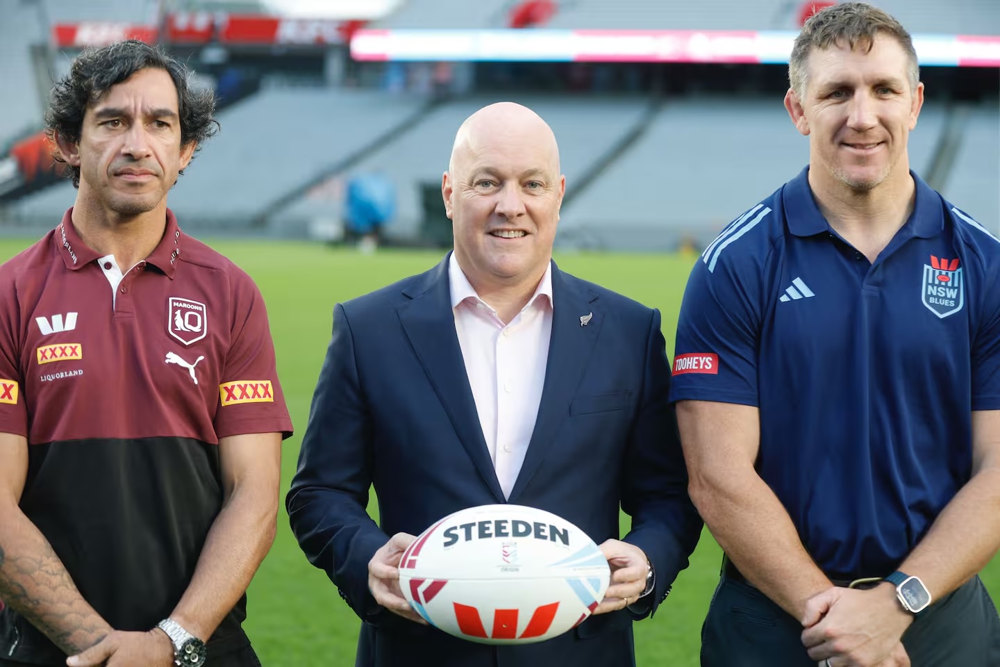 Prime Minister Christopher Luxon with former State of Origin players Jonathan Thurston (left) and Ryan Hoffman at Auckland's Eden Park.