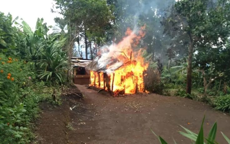 A home destroyed in tribal fighting in PNG's Highlands region.