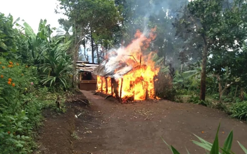 A home destroyed in tribal fighting in PNG's Highlands region.
