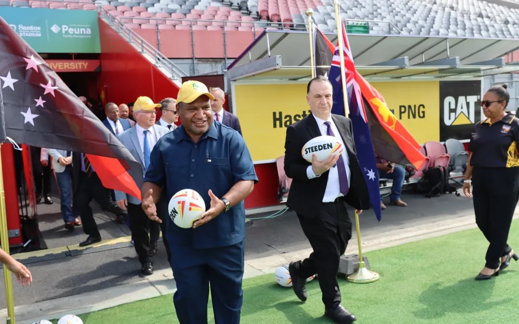 ARLC chairman Peter V'landys AM and NRL CEO Andrew Abdo, alongside PNG Prime Minister James Marape and Australian Minister for Pacific Island Affairs Pat Conroy.