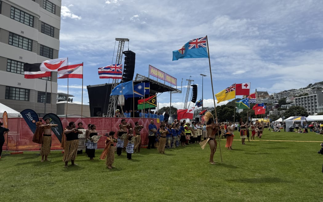 Country flag bearers at the opening ceremony of the Wellington Pasifika Festival 2026.