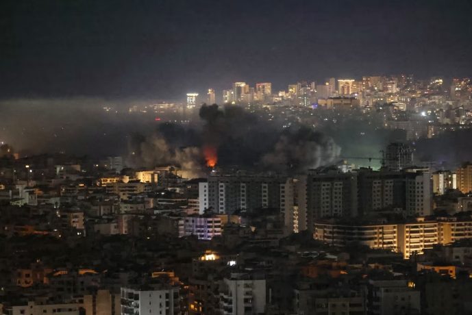 Smoke rises from the site of an Israeli airstrike that targeted Beirut's southern suburbs Haret Hreik neighborhood on Thursday, March 5