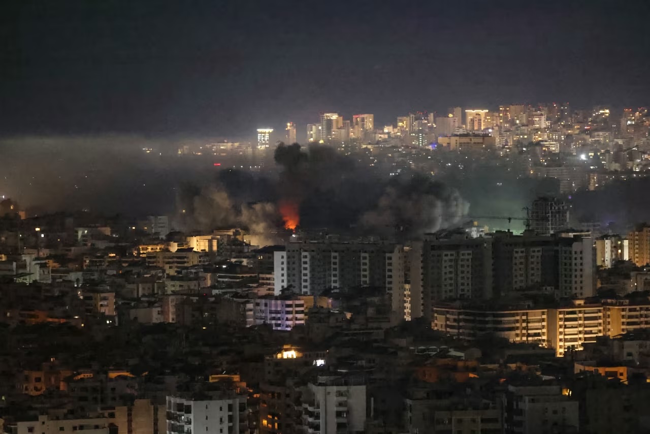 Smoke rises from the site of an Israeli airstrike that targeted Beirut's southern suburbs Haret Hreik neighborhood on Thursday, March 5