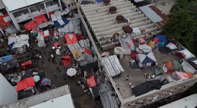 Makeshift tents at a school turned shelter for people displaced by gang violence (October 28, 2025)