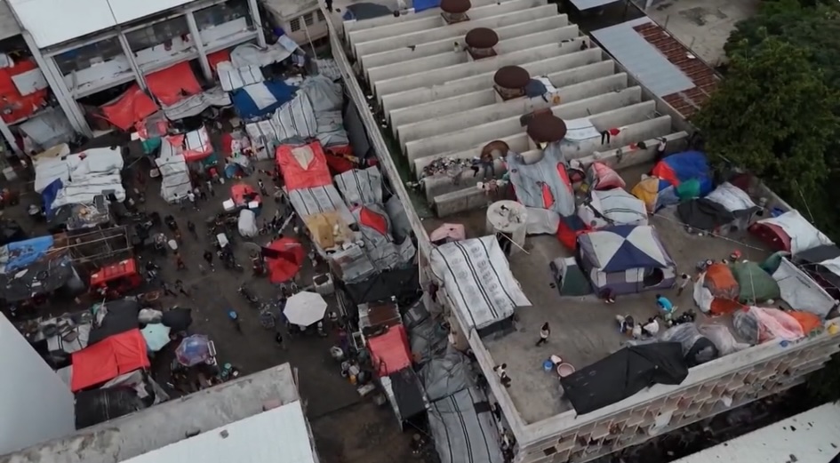 Makeshift tents at a school turned shelter for people displaced by gang violence (October 28, 2025)