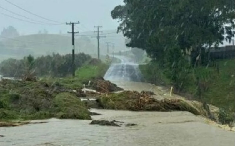 A-ruptured-farm-dam-has-blocked-Taupo-Bay-Road-in-the-Far-North.