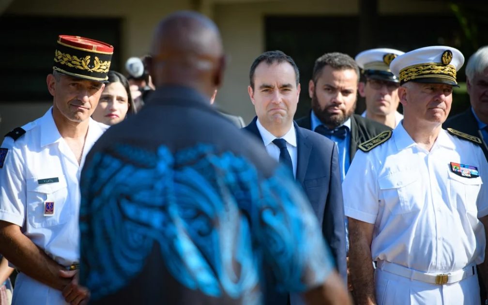 French Prime Minister Sébastien Lecornu in 2023 when he was the French Minister of Defence performs the customary greeting at the customary senate of New Caledonia. 3 December 2023.