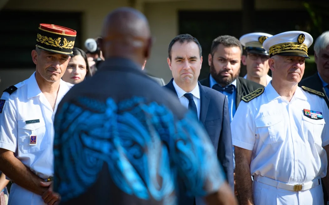 French Prime Minister Sébastien Lecornu in 2023 when he was the French Minister of Defence performs the customary greeting at the customary senate of New Caledonia. 3 December 2023.