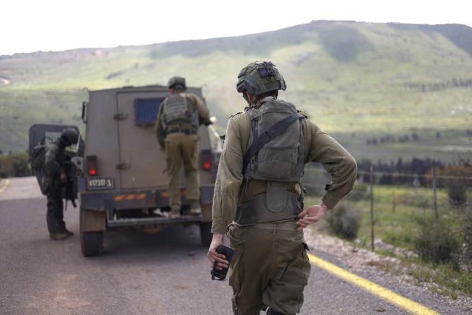 Israeli soldiers patrol along the Israel-Lebanon border on April 10, 2026. The Israeli military said on April 10 that it had "dismantled" more than 4,300 Hezbollah sites in Lebanon since fighting with the militant group began last month.