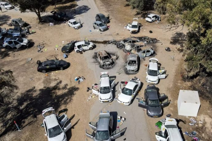 Abandoned and torched vehicles at the site of the October 7, 2023, attack by Palestinian militants on the Supernova desert music festival in southern Israel.