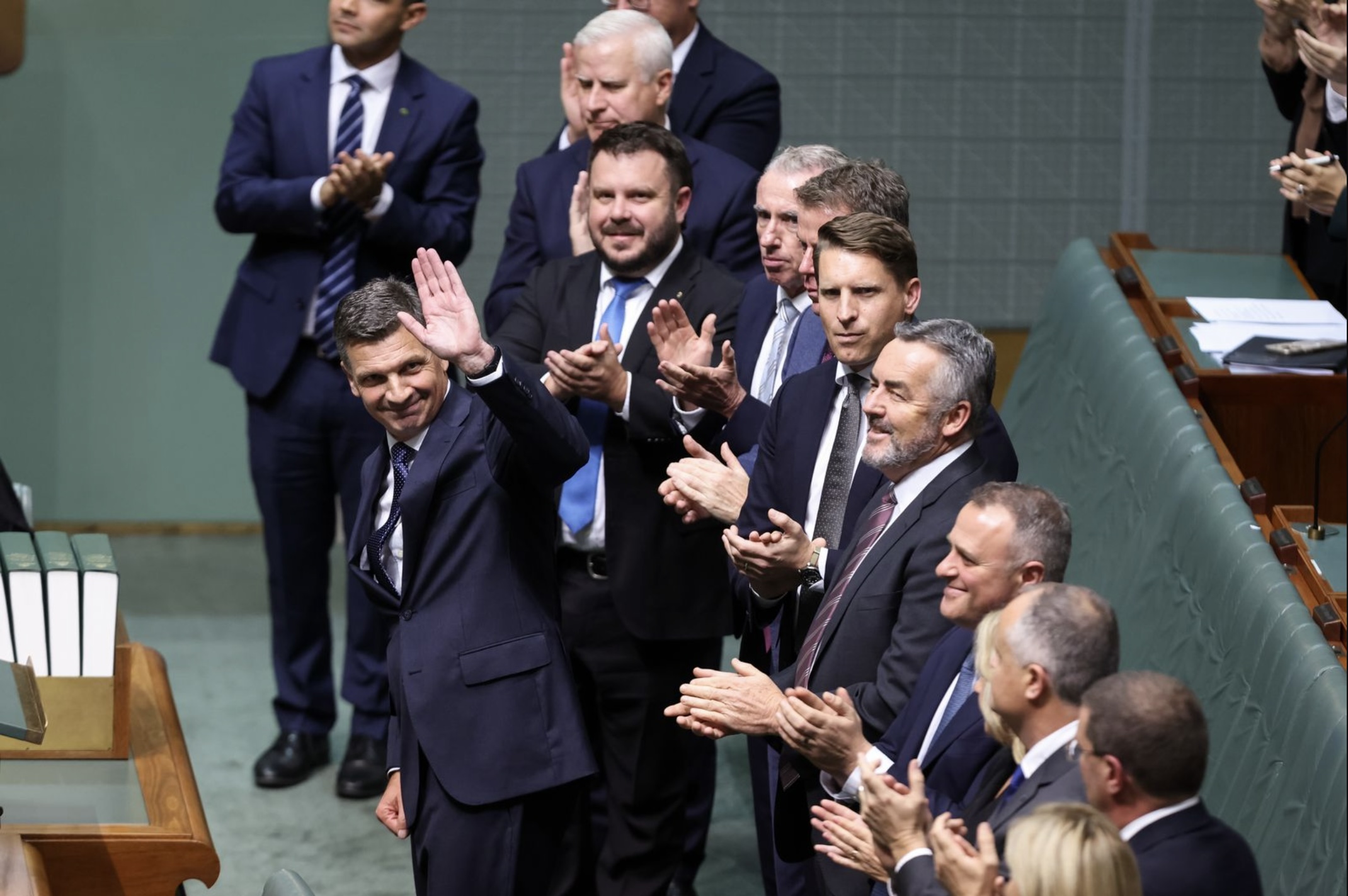 Angus Taylor was met with a standing ovation from his side of the chamber.