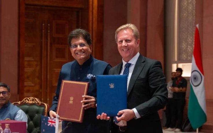Indian Commerce and Industry Minister Piyush Goyal and New Zealand's Trade Minister Todd McClay sign the free-trade agreement.