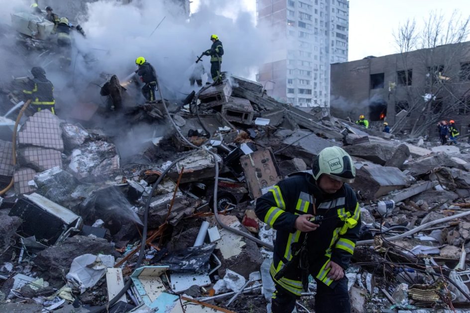 Rescuers search for people under the rubble of the Kyiv apartment building, following the largest aerial attack on Ukraine in a two-day period since the war began.