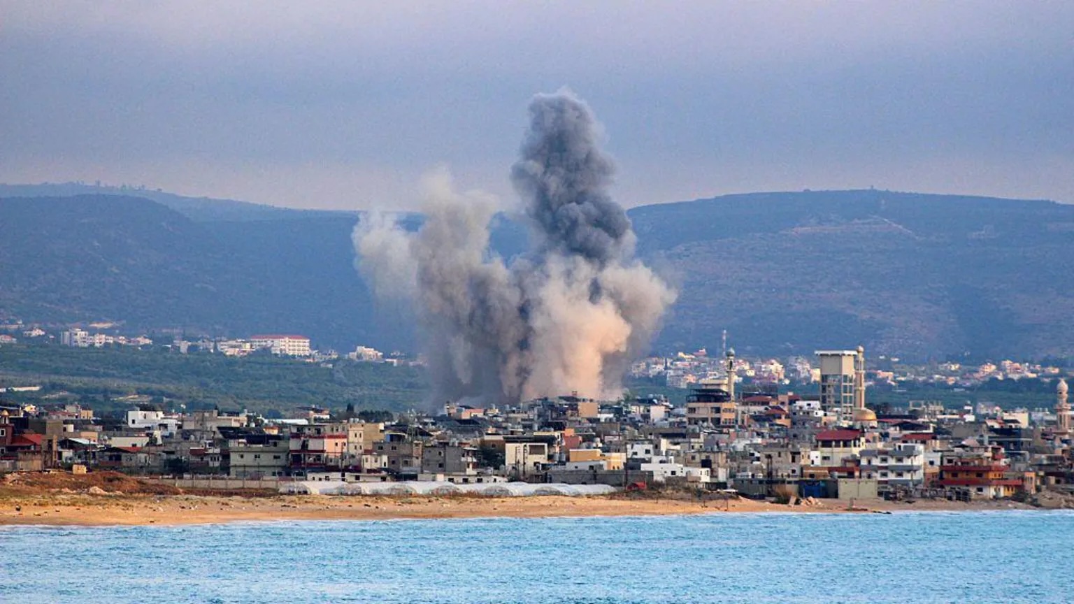 Smoke rises into the air following an Israeli strike near the southern city of Tyre on Wednesday.