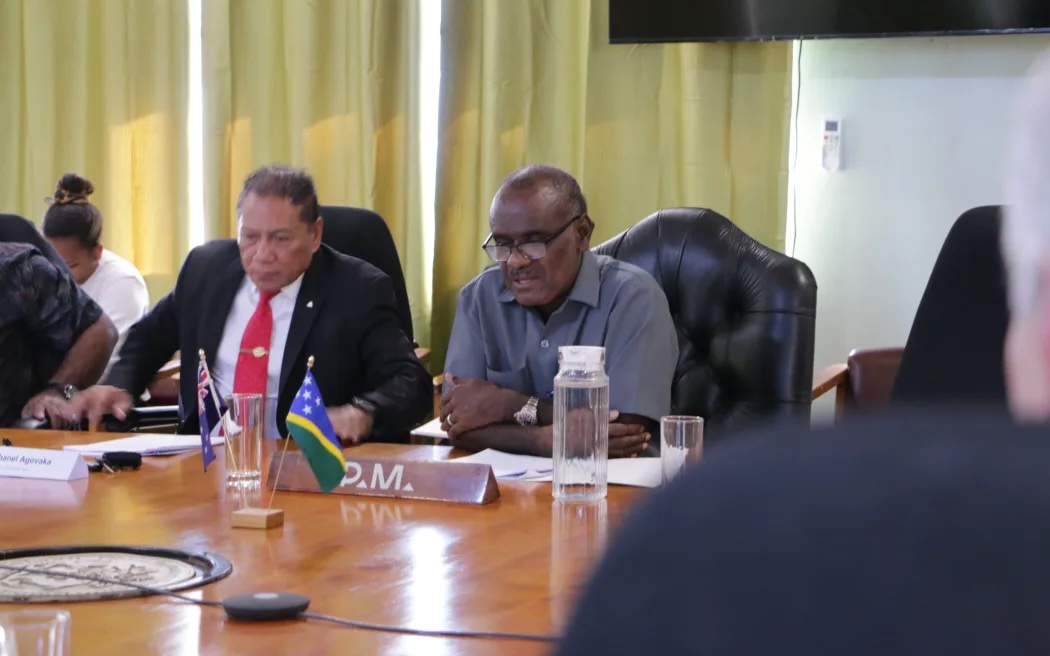 Solomon Islands caretaker Prime Minister Jeremiah Manele, right, with his then-Foreign Affairs Minister Peter Shanel Aqovaka. July 2024.