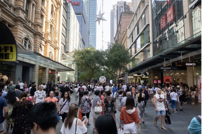 There will be 35,000 more migrants in Australia this financial year than previously expected, driven by fewer foreigners on temporary visas leaving, according to the budget papers.