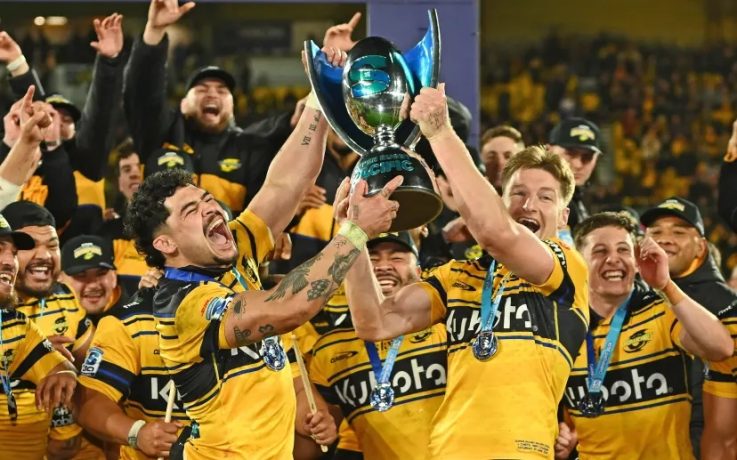 Co-captains Du'Plessis Kirifi and Jordie Barrett of the Hurricanes celebrate winning the Super Rugby title on Saturday night.