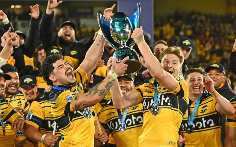 Co-captains Du'Plessis Kirifi and Jordie Barrett of the Hurricanes celebrate winning the Super Rugby title on Saturday night.