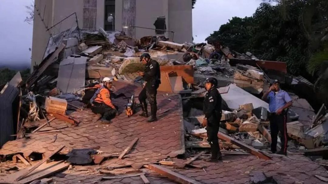 Emergency services searched through rubble following the tremors in Caracas.