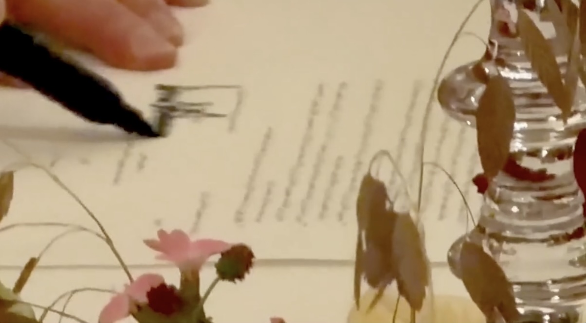 Trump signs hard copy of US-Iran agreement.
