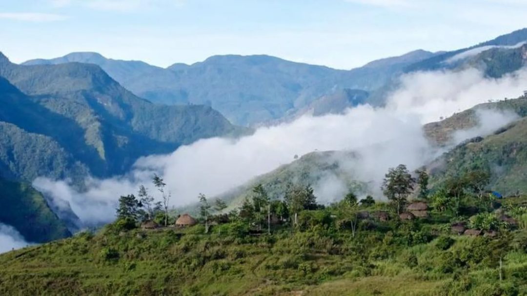 There has been conflict for decades in Papua, seen here in this file photo with fog rolling over green mountains.