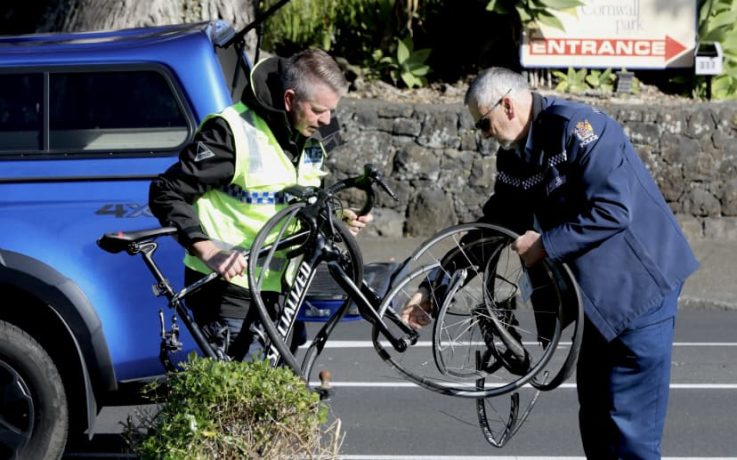 Police remove bicycles from the scene.