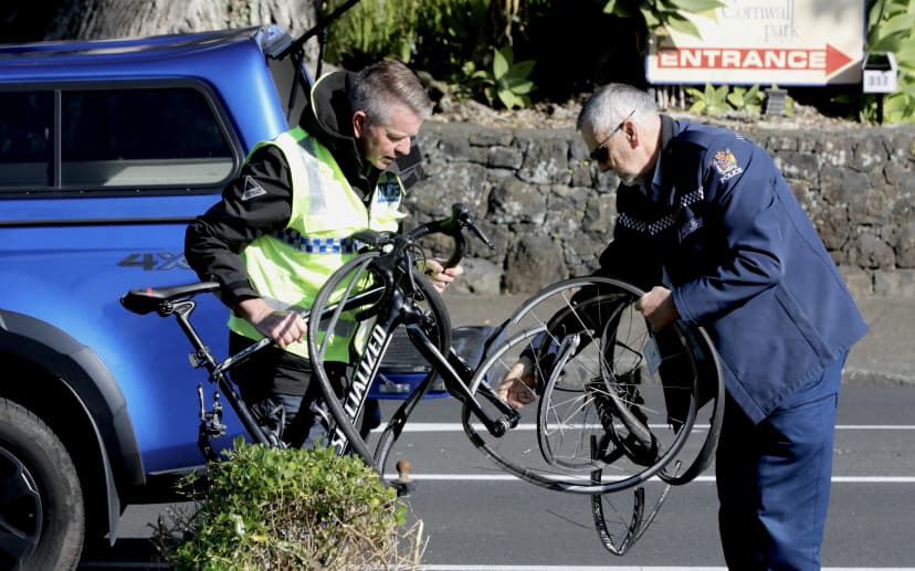 Police remove bicycles from the scene.
